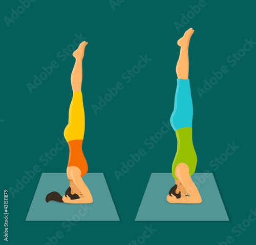 Foto Man and woman headstand pose