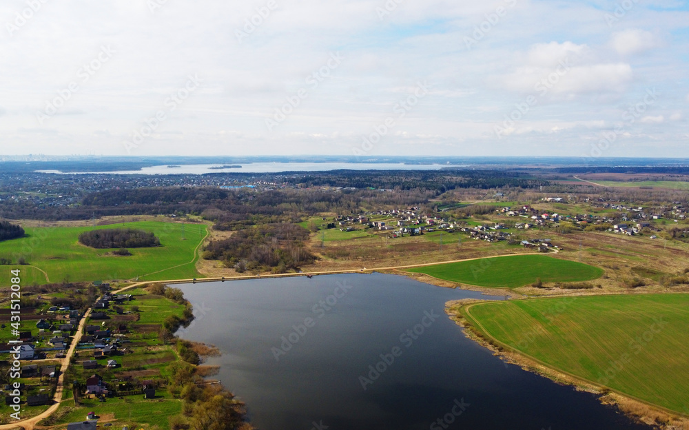 Top view of a forest lake in summer