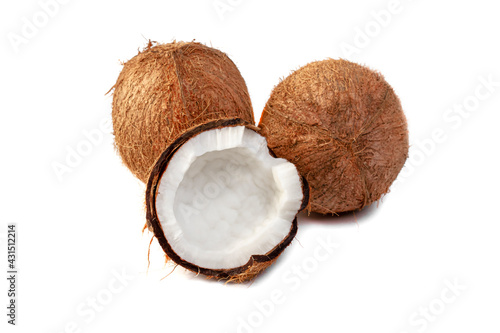 Tropical fruits. Two coconuts and half a coconut on an isolated background. Healthy food concept.