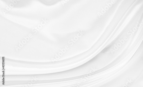 White gray satin texture that is white silver fabric silk background with beautiful soft blur pattern natural.