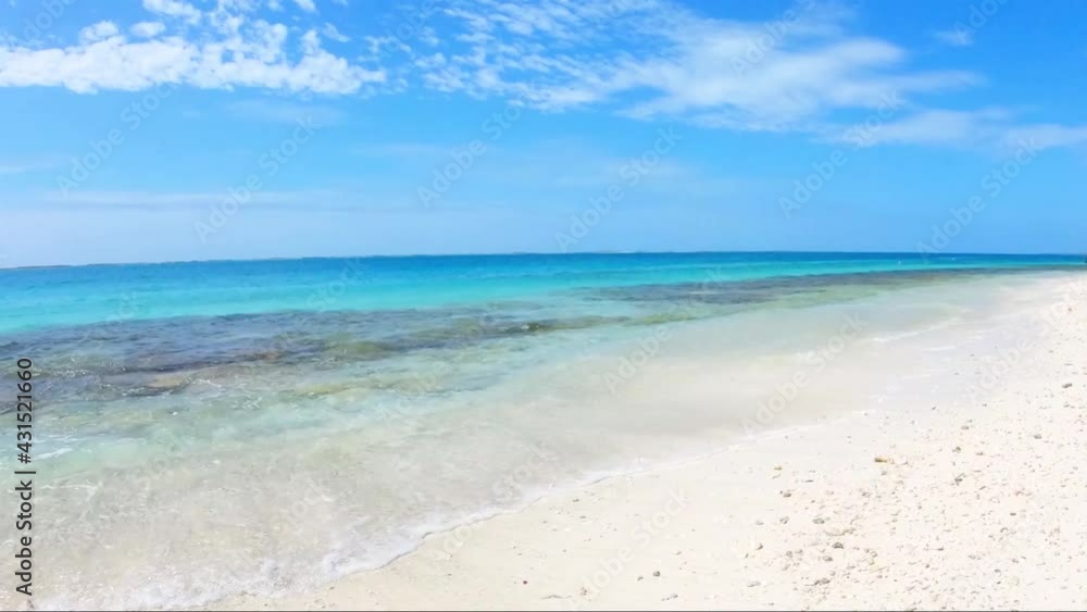 exotic tropical beach scene pan left of The Shore beach crasky los roques , venezuela exotic tropical beach scene pan left of The Shore beach crasky los roques , venezuela