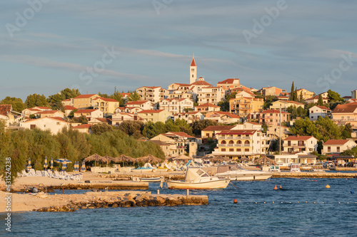 Small Mediterranean town Seget Donji near the Trogir town at sunset, Croatia