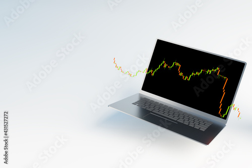 forex stock chart and laptop for trading forein exchange market photo