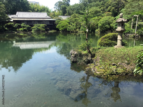 Kohama Pond filled with clear spring water at Rakujuen Park, Mishima, Japan