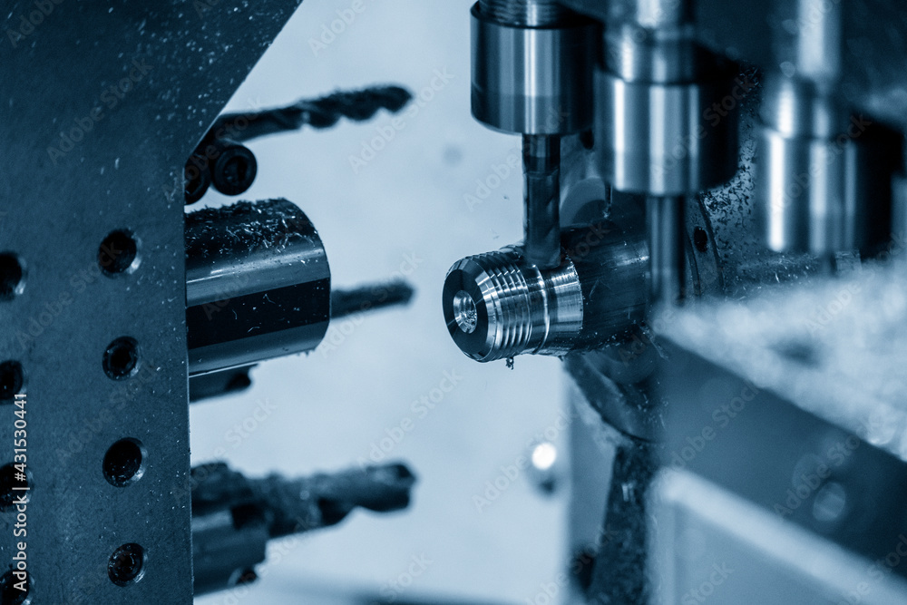 The operation of multi-tasking CNC lathe machine swiss type tapping on the pipe connector parts. The hi-technology pipe connector parts by CNC turning machine. The operation of multi-tasking CNC lathe machine swiss type tapping on the pipe connector parts. The hi-technology pipe connector parts by CNC turning machine.