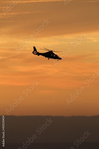 helicopter in the sunset