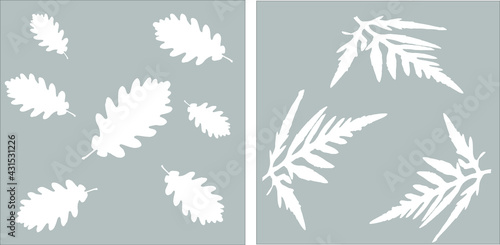 
pattern of oak leaves and exotic leaves on a gray background