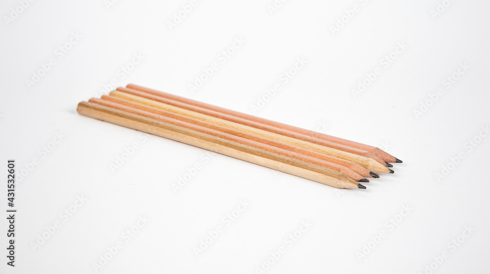 Wooden pencil on white background