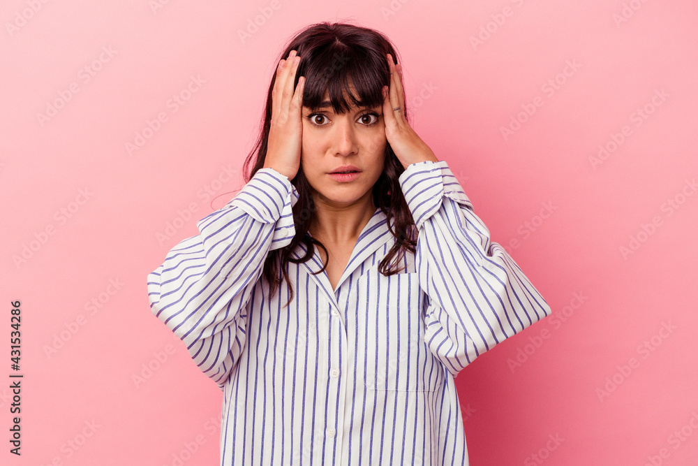 Young caucasian woman isolated on pink background being shocked, she has remembered important meeting. Young caucasian woman isolated on pink background being shocked, she has remembered important meeting.