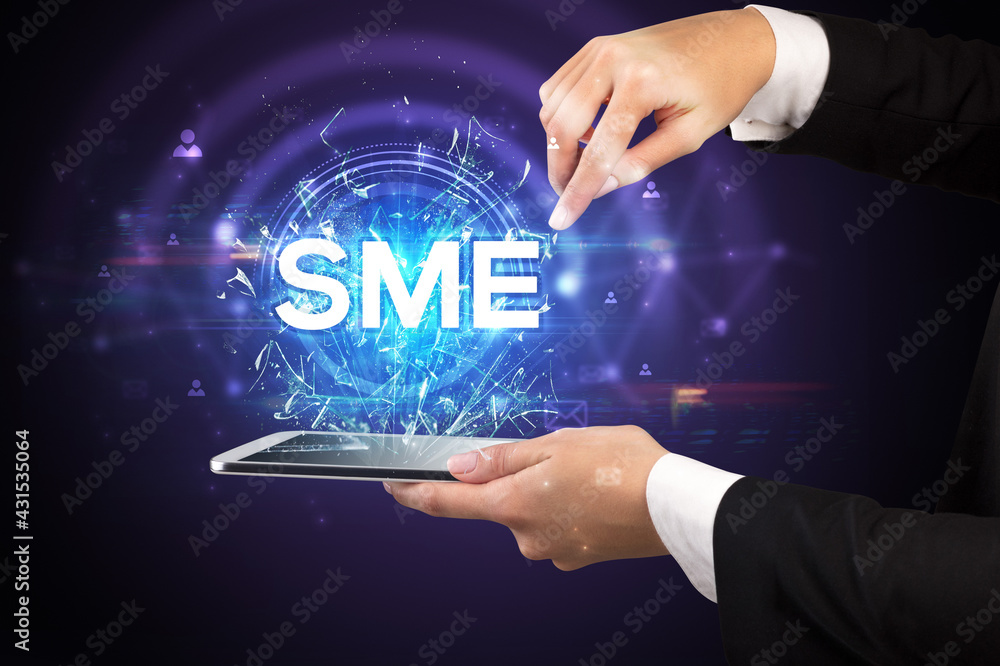 Close-up of a touchscreen with abbreviation. Close-up of a touchscreen with abbreviation.