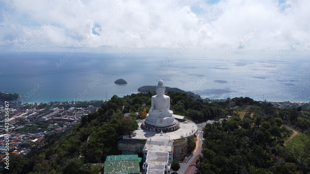 Big Buddha statue in Phuket drone shooting on a cloudy day