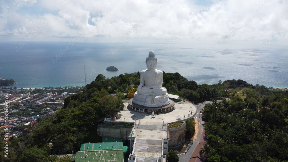 Big Buddha statue in Phuket drone shooting on a cloudy day