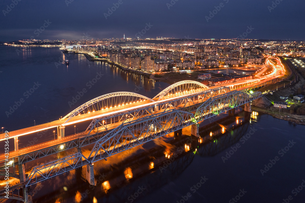 Aerial late evening view on the bridge over the Volga and Nizhniy Novgorod city