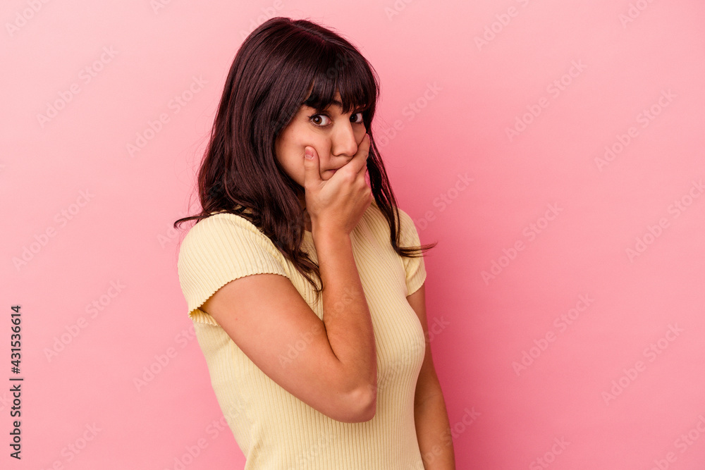 Young caucasian woman isolated on pink background scared and afraid. Young caucasian woman isolated on pink background scared and afraid.