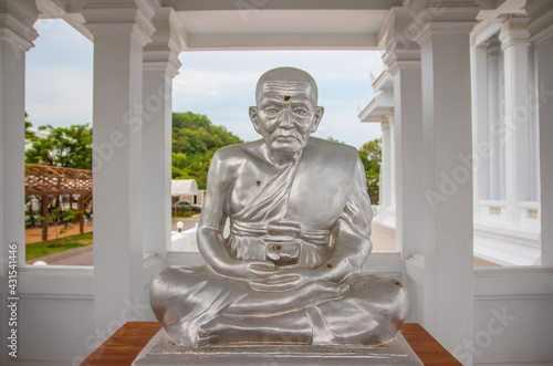 silver monk statue at the Wat Khao Din Temple, Pattaya District, Chonburi, Thailand photo