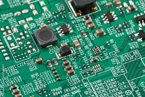 Electronic board with radio parts and chip processor from electronic device. Top view. Selective focus.