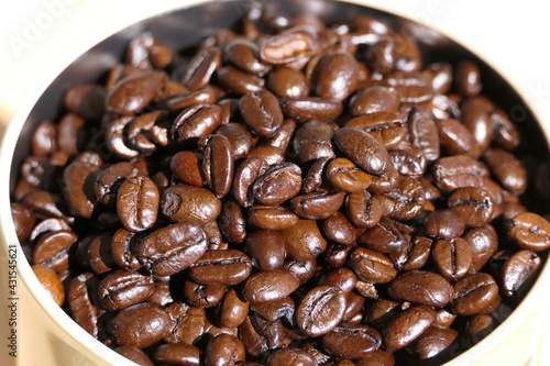 Tasty dark brown whole organic coffee beans