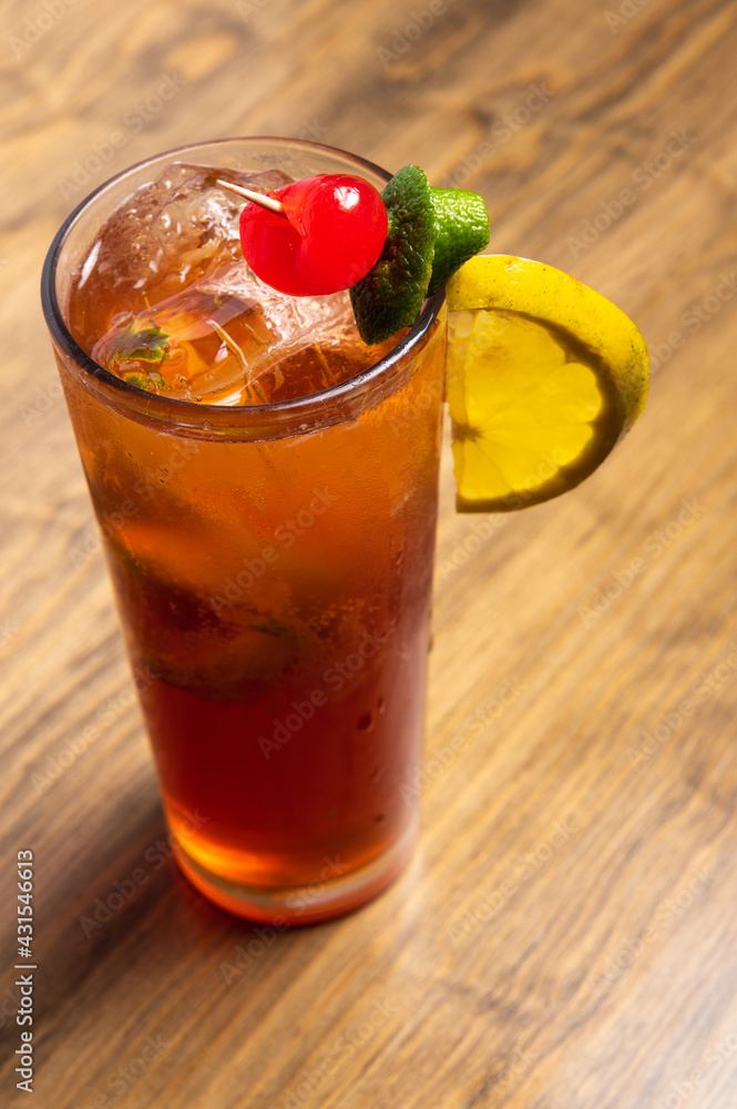 Tropical cocktails on wooden background. Frutal alcoholic cocktails. Colorful drinks concept. Tropical cocktails on wooden background. Frutal alcoholic cocktails. Colorful drinks concept.