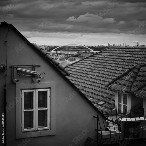 Photography Bratislava cityscape with houses and A|pollo bridge in black and white, Slovakia