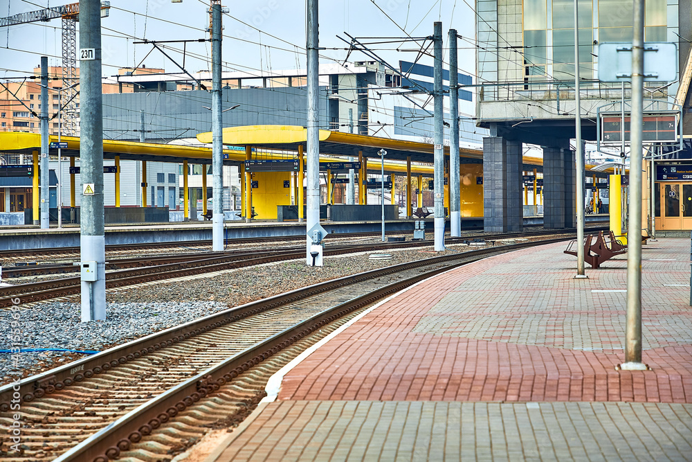 Fototapeta premium Platform for boarding passengers on long-distance trains.Rails and sleepers.