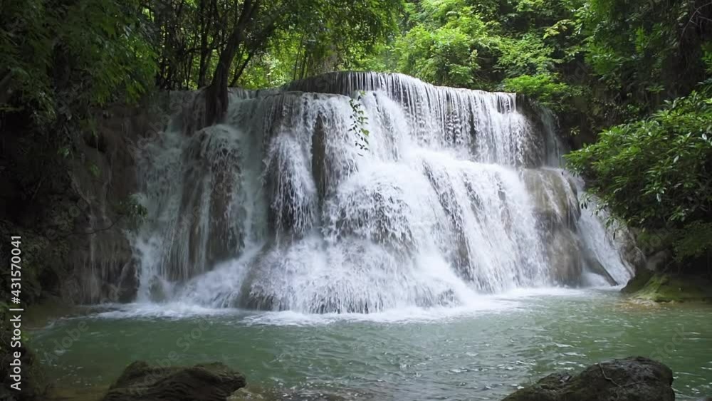 Huai Mae Khamin Waterfall, third level, wild tropical forest in National Park, Kanchanaburi, Thailand - Slow Motion Huai Mae Khamin Waterfall, third level, wild tropical forest in National Park, Kanchanaburi, Thailand - Slow Motion