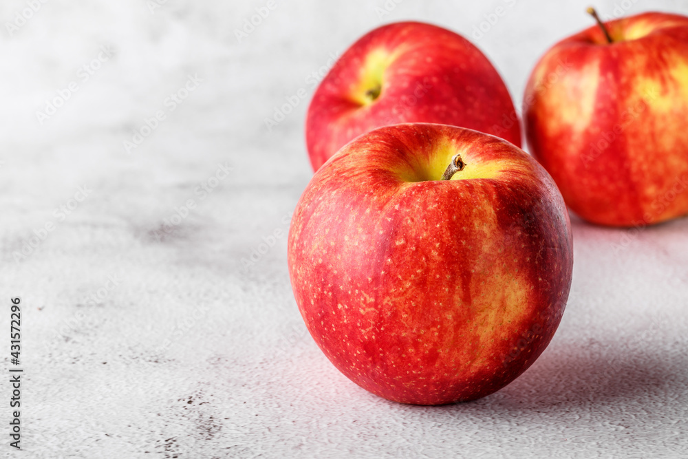 red apples on blackboard or chalkboard background. Bright fruit composition. Close-up on a gray background. red apples on blackboard or chalkboard background. Bright fruit composition. Close-up on a gray background.