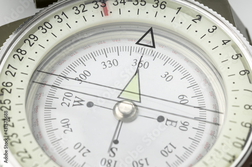 Close up of a compass. Guidance concept