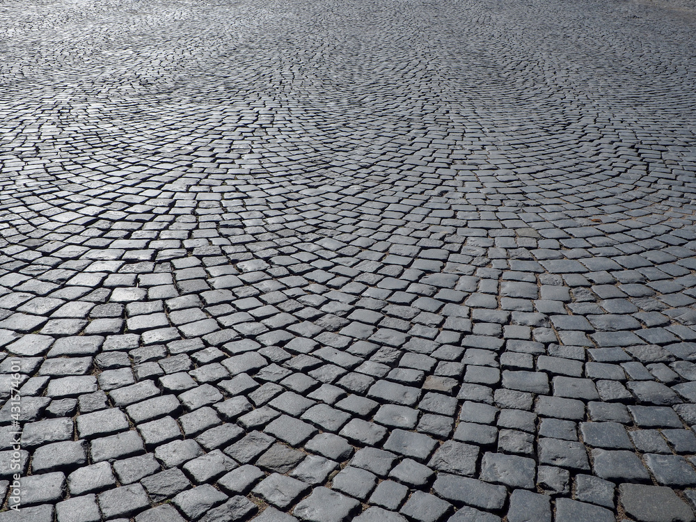 pavement covered with paving stones in a semicircular pattern
