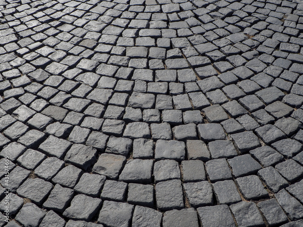 pavement covered with paving stones in a semicircular pattern