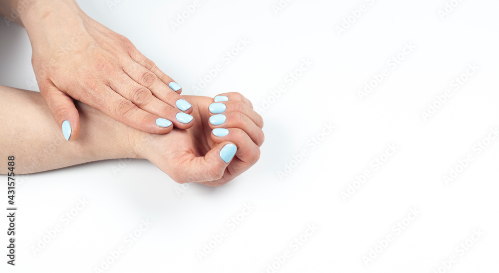 Manicure. Female hands with turquoise manicure. On white background. Manicure. Female hands with turquoise manicure. On white background.