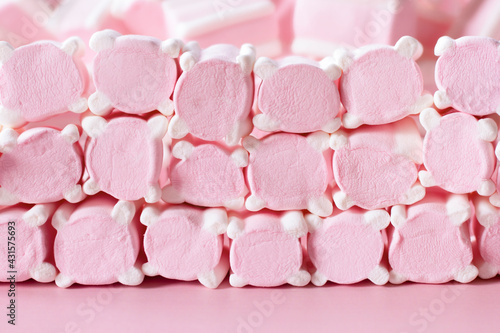 marshmallow on a pink background side view. background with marshmallow