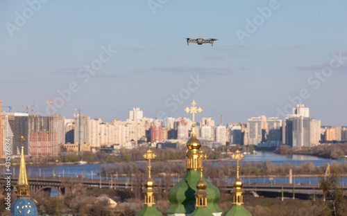 Drone flies over church photo