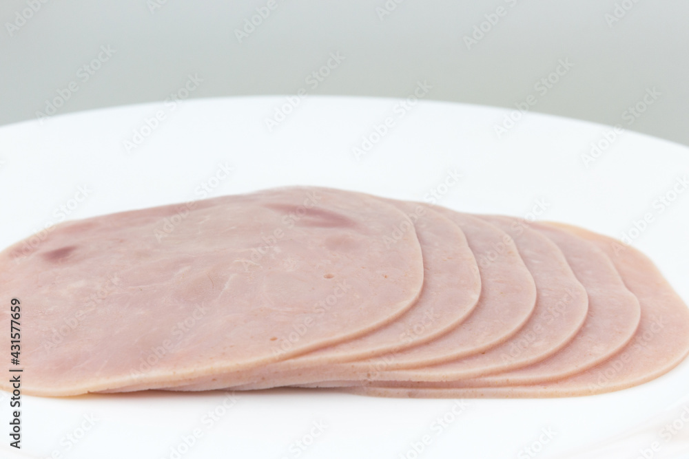 Close-up, background of raw ham, sliced, stack Close-up, background of raw ham, sliced, stack