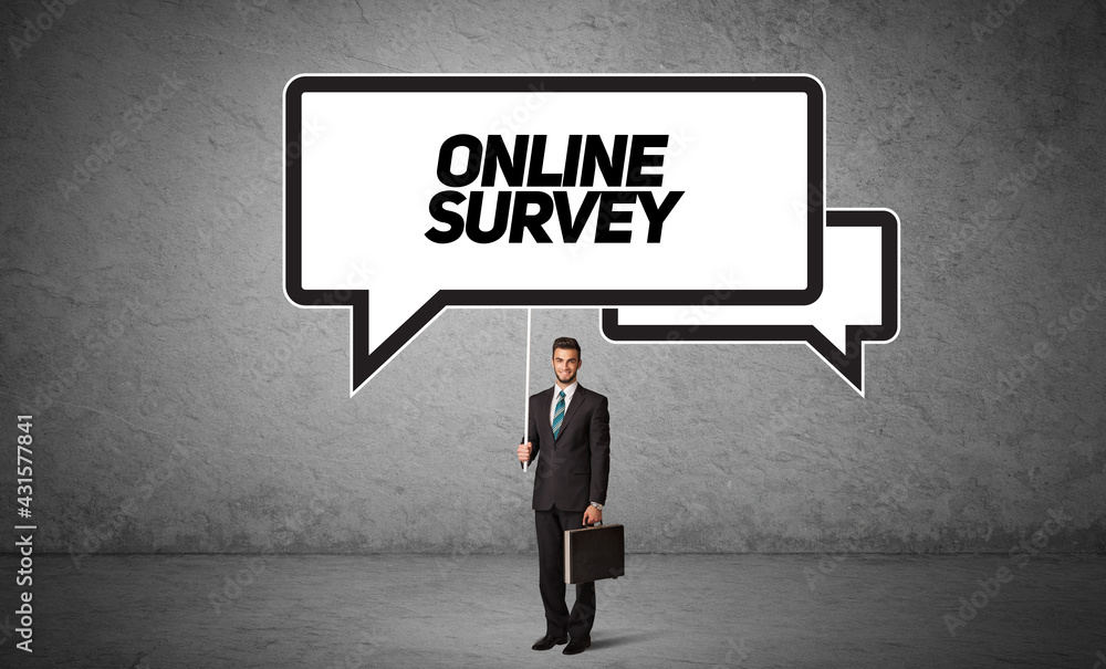 business person in casual holding road sign