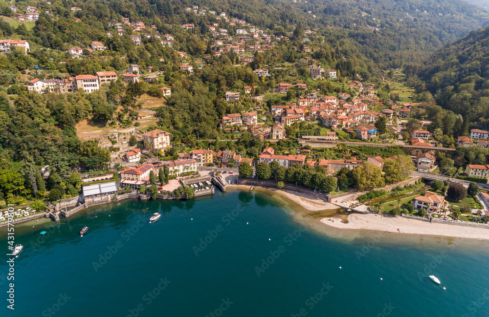 Aerial view of little village Colmegna on the coast of lake Maggiore, municipality of Luino, Lombardy, Italy
