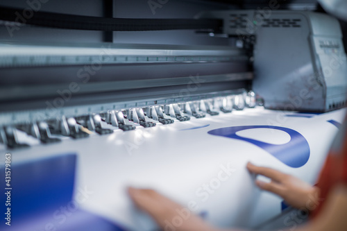 Closeup detail view of a plotter printer
