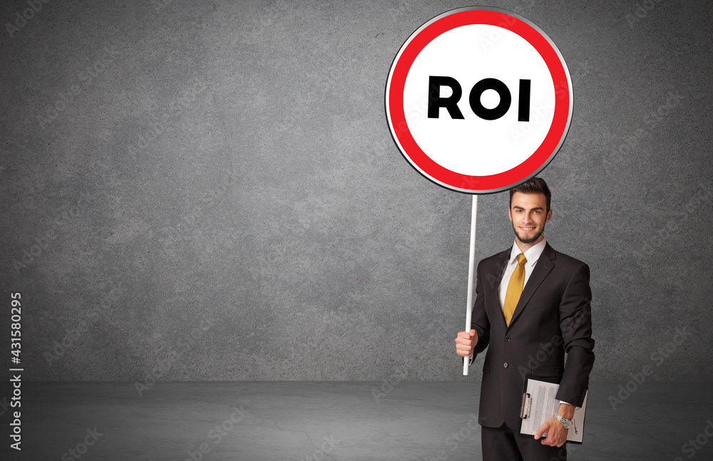 Young business person holdig traffic sign Young business person holdig traffic sign