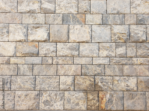 Natural rough stone wall cladding for exterior wall. Wall cladding
