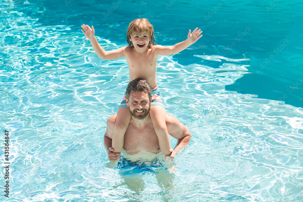 Fathers piggyback ride child in swimming pool. Active leisure.