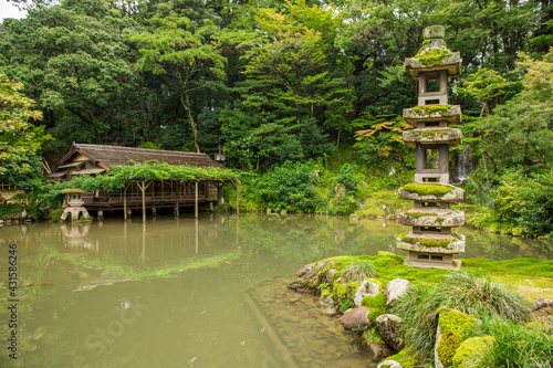 Kenrokuen Garden, Kenroku-en Gardens, Tea house Machiya on a lake. Kanazawa Castle, Japan. Beautiful Japanese peaceful zen park with water landscape