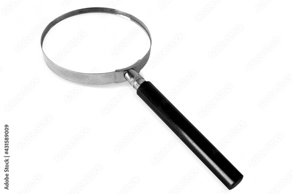 A metal magnifying glass on white background, isolated. A metal magnifying glass on white background, isolated.