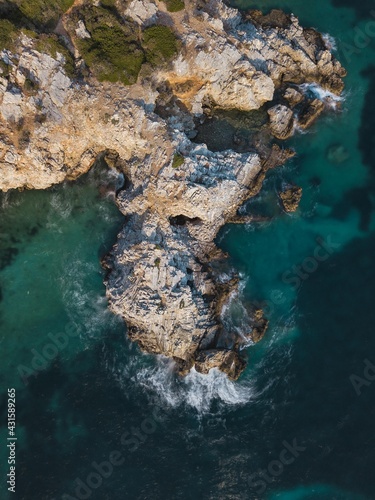 Top down photo of a clif next to the sea in Samos island