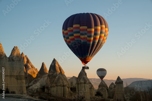 Balloons flying in Cappadocia, Göreme at sunrise. Cappadocia is known around the world as one of the best places to fly with hot air balloons. Turkey.