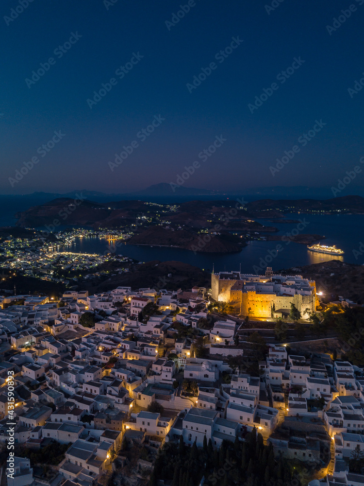 Patmos town from an aerial drone shot during the blue hour