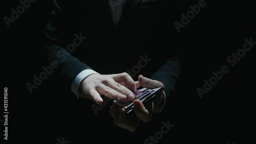 playing card flies from hand to hand in close-up. High quality FullHD footage