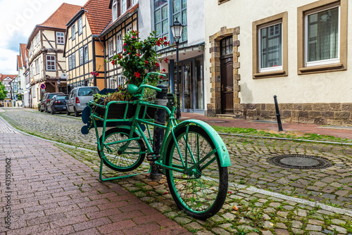 Old green retro bicycle in Hamelin, Germany