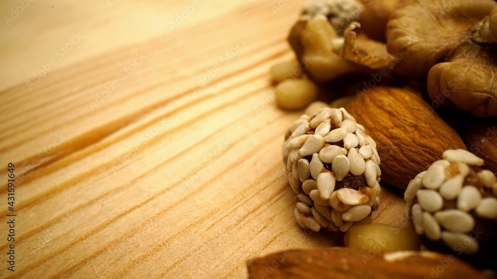 Nuts on a wooden background. close-up and selective focus. Nuts on a table close-up. Nuts on a wooden background. close-up and selective focus. Nuts on a table close-up.