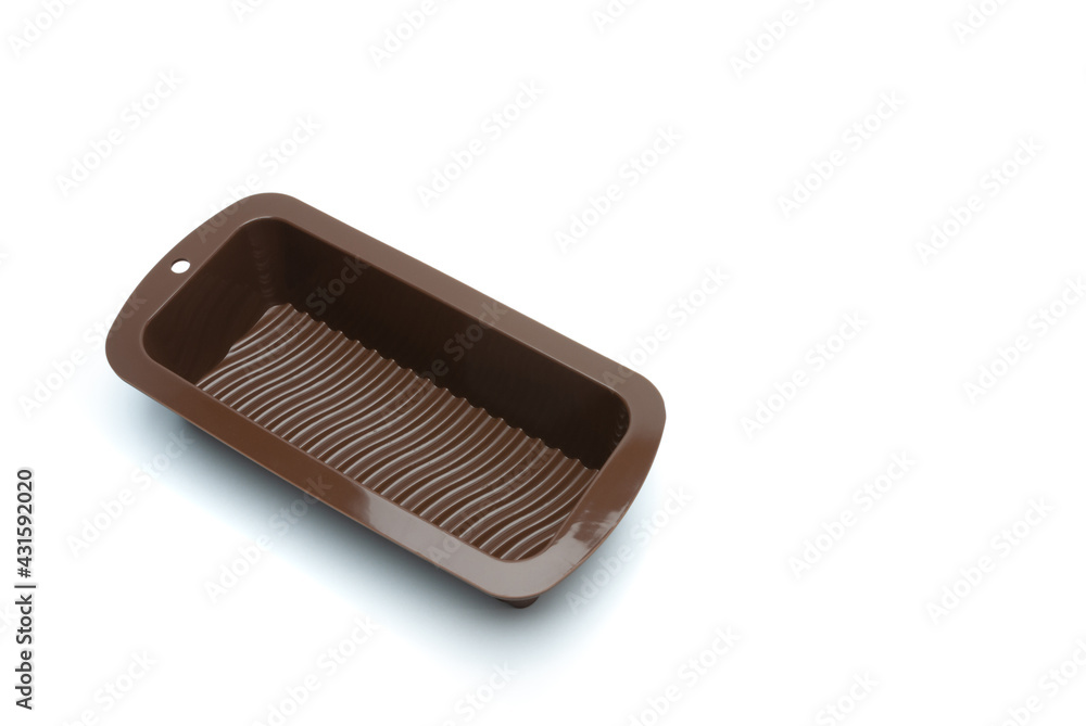 The silicone baking dish is insulated against a white background