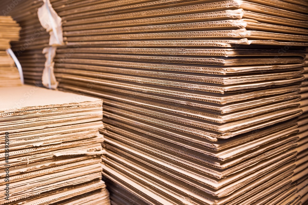 Close-up sides of stacks of cardboard folded Close-up sides of stacks of cardboard folded