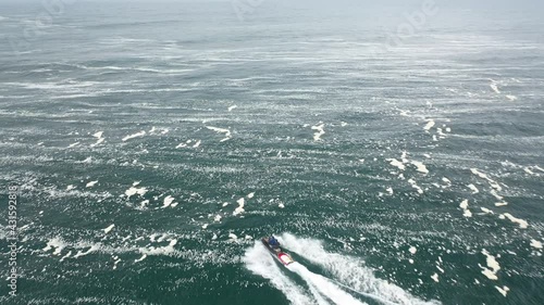 surf rescue with jet ski, to surf big waves in pichilemu chile punta de lobos